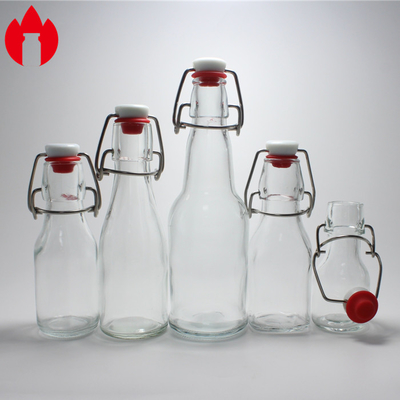 Flacone in vetro stampato trasparente personalizzato utilizzato per soda, succo, vino, birra, bevande